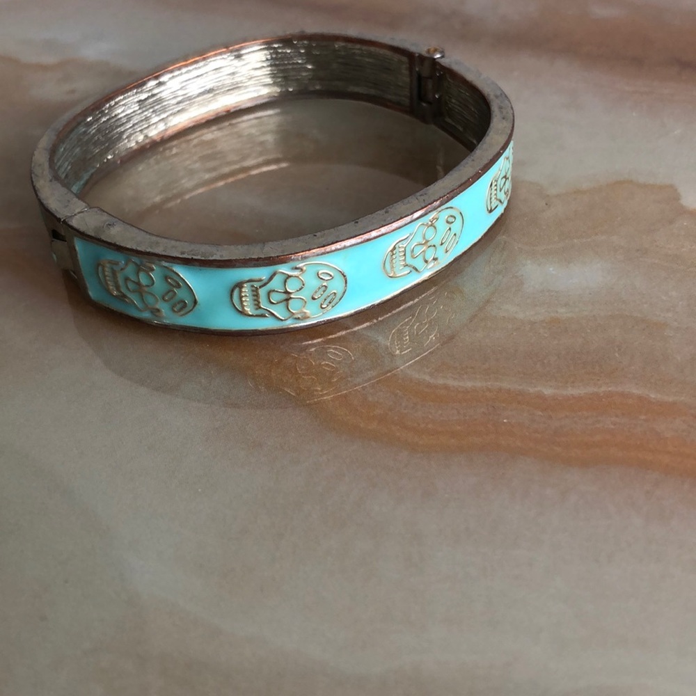 Turquoise and gold enamel skull bracelet